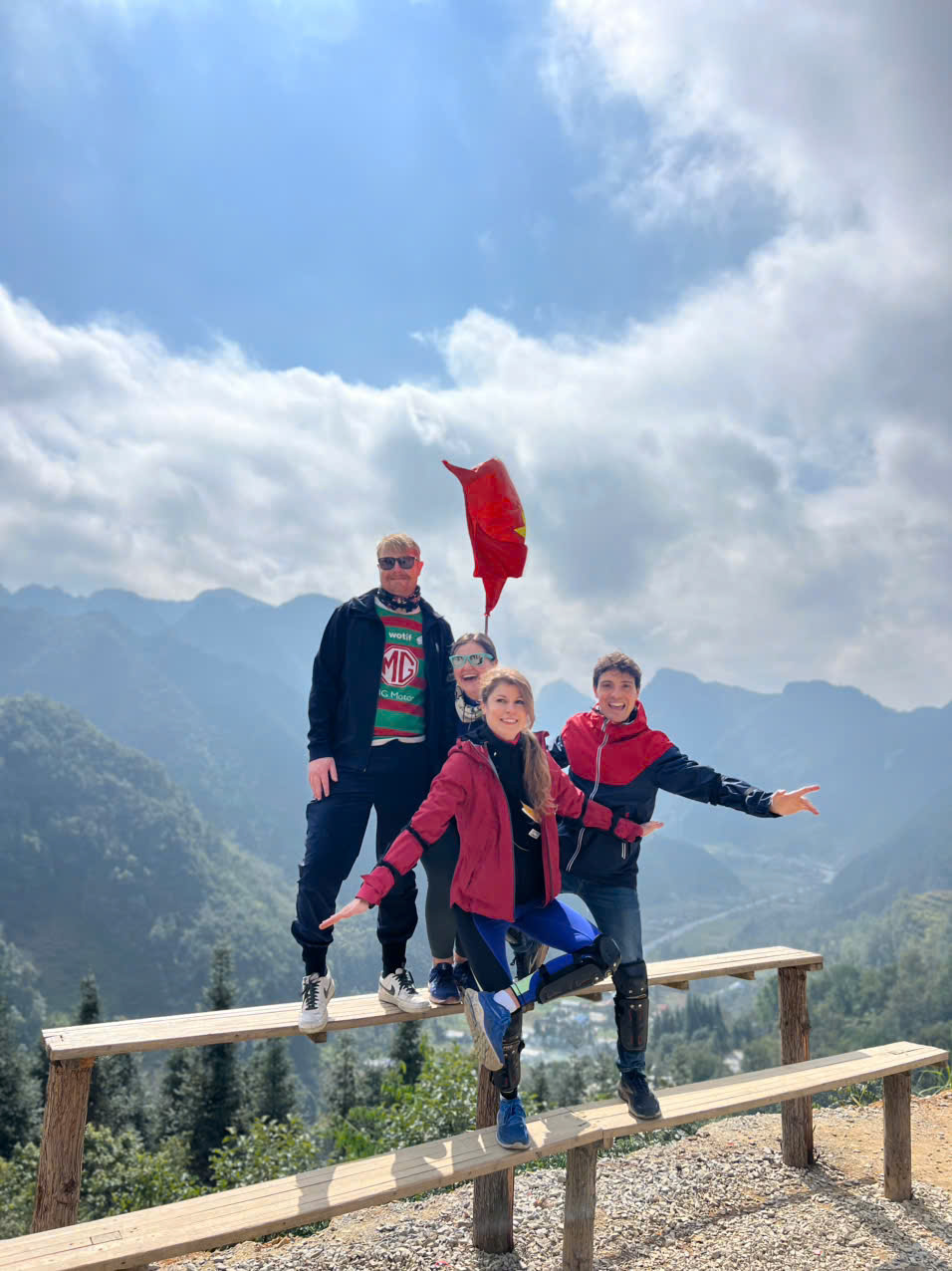 Google Maps review photo of a Mr Biu Ha Giang Loop tour group with the Vietnamese flag