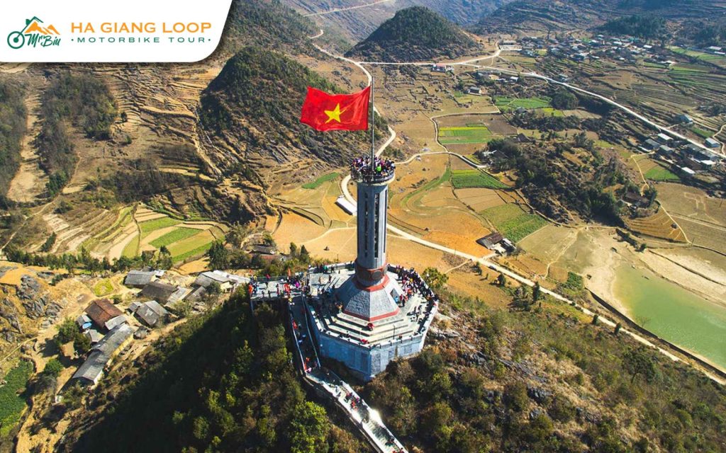 The tower stands tall with a large flag representing Vietnam’s 54 ethnic groups