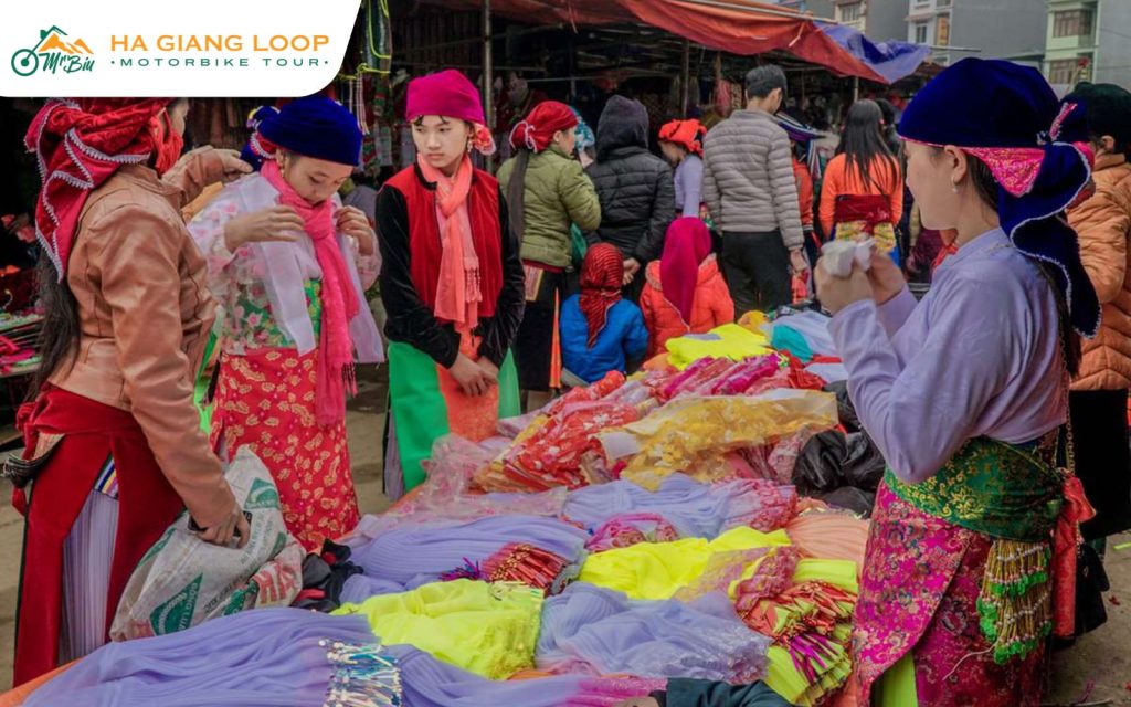Visitors shop, eat, and enjoy local traditions at Meo Vac market