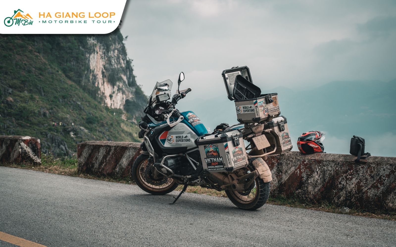 Motorbikes riding along winding roads above the River