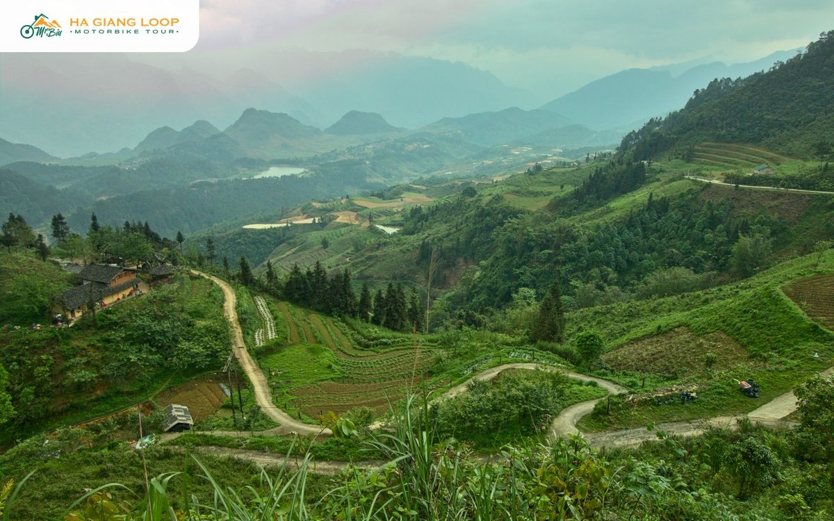 Hillside terraces and earthen houses in Quan Ba, the setting of Nam Dam village
