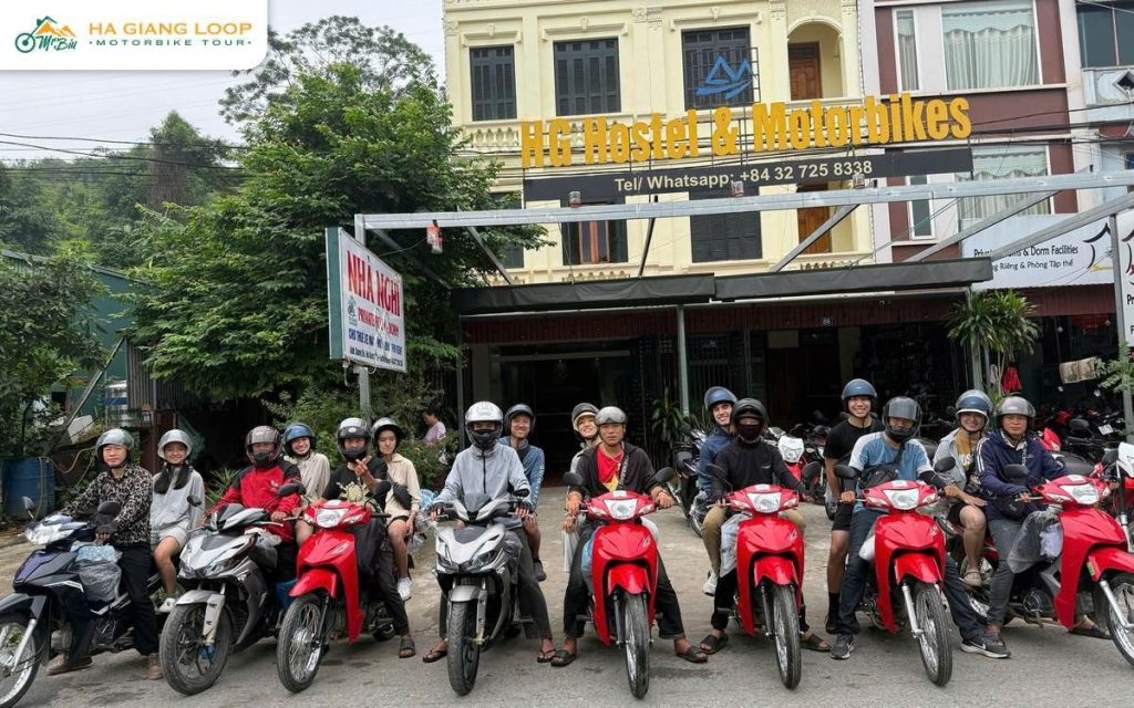 Ha Giang tour motorbikes lined up outside the Mr. Biu hostel