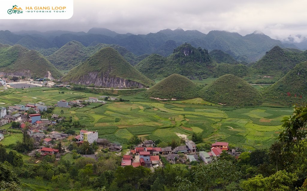 Twin Mountains, Tam Son town and green fields seen from above